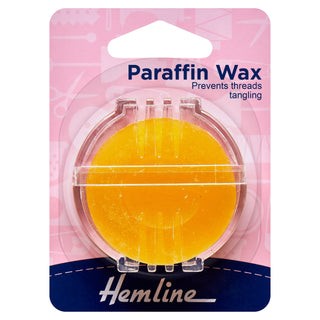 Hemline Paraffin Wax Bead Thread Conditioner in a Dispenser